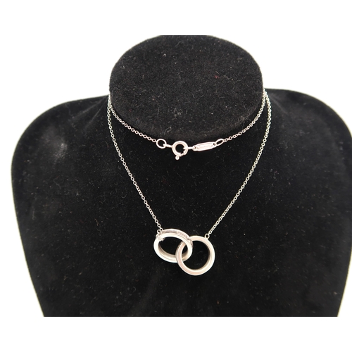 15 - A Tiffany & Co 1837 Interlocking Circles pendant stamped 925. Weight 4.90 grams