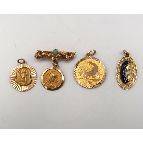 17 - Three pendant charms stamped 585 and 375. Weight 6.13 grams, a brooch suspending a medallion,  Stamp... 