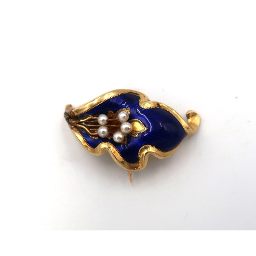 25 - A seed pearl and blue enamel foliate brooch. Tests 14ct. Weight 3.84 grams