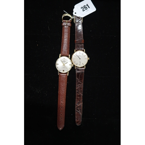 261 - A gents Swissam manual wind watch on brown leather strap, running in saleroom, case size 34mm, toget... 