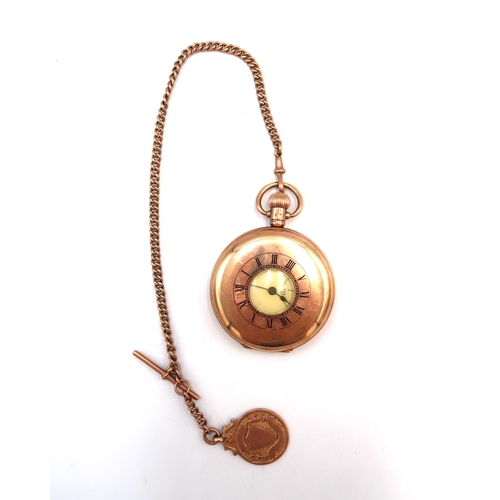 271 - A 9ct yellow gold hallmarked cased half hunter pocket watch with 9ct gold chain and shield medallion... 