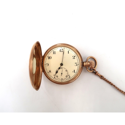 271 - A 9ct yellow gold hallmarked cased half hunter pocket watch with 9ct gold chain and shield medallion... 