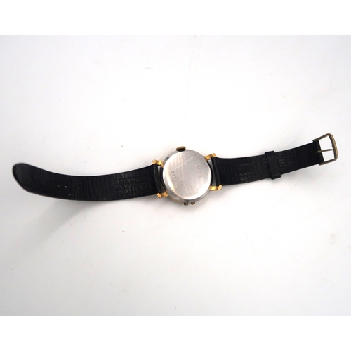 283 - An unmarked Gents wristwatch, case diameter approx 3cm, day and date aperture at 12 0 clock, running... 