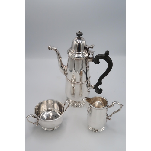 327 - A limited edition reproduction silver hallmarked coffee service consisting of coffee pot, milk and s... 