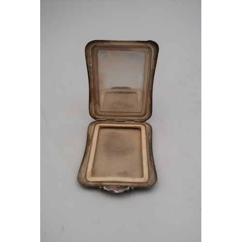 344 - A silver hallmarked ladies compact Birmingham 1940, total weight approx 2.62 troy oz, fitted with mi... 