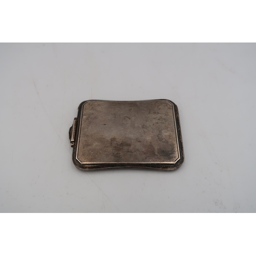 344 - A silver hallmarked ladies compact Birmingham 1940, total weight approx 2.62 troy oz, fitted with mi... 