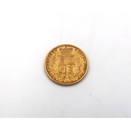 393 - A 1858 Shield back full gold sovereign, 7.98grams