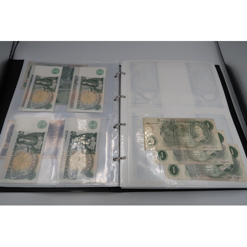 402 - An album containing Seventy seven pages of World banknotes including £1 and £5 examples in consecuti... 