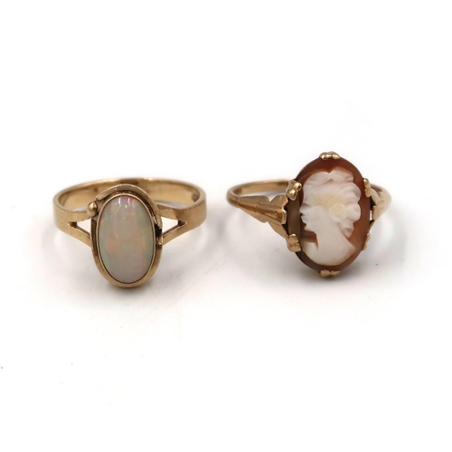 42 - A stamped 9ct yellow gold cameo ring size L, and a stamped 10K oval opal ring, size N, 4.6grams.