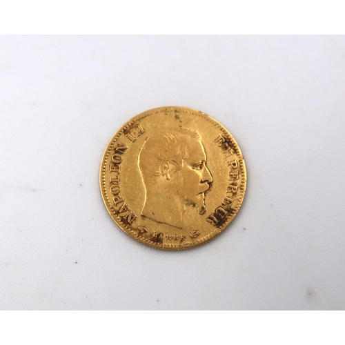 425 - A 1857 10 Franc .900 gold coin, approx 6.5 grams