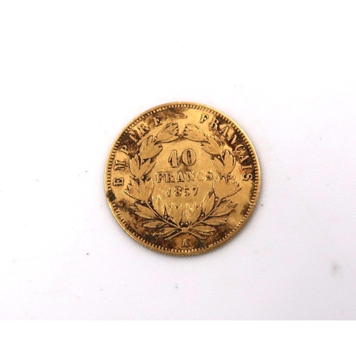 425 - A 1857 10 Franc .900 gold coin, approx 6.5 grams