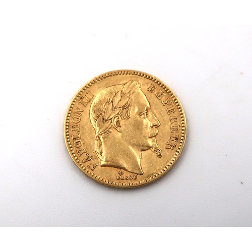 428 - A 1865 Napoleon III 20 Franc .900 gold coin, approx 6.5 grams