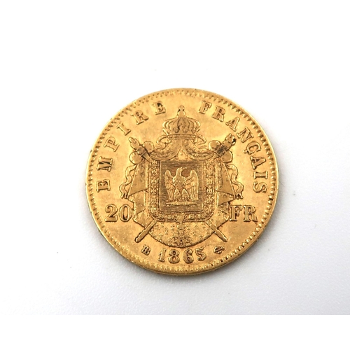 428 - A 1865 Napoleon III 20 Franc .900 gold coin, approx 6.5 grams