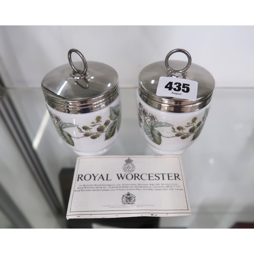 435 - A pair of Royal Worcester egg coddlers in the Lavinia pattern