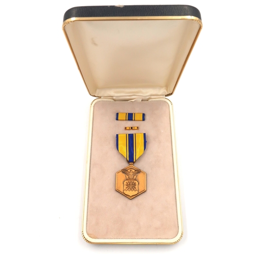 438 - A Military merit medal, a silver French academic medal and a Securicor medal