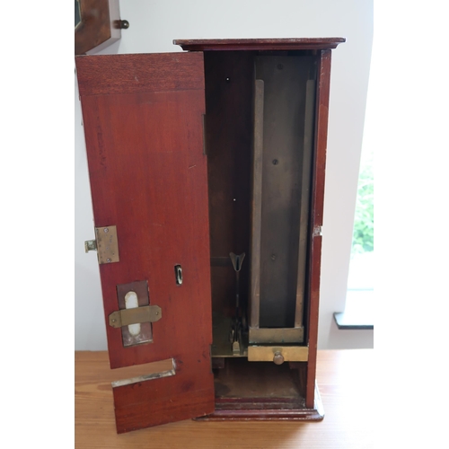 451 - Circa 1910-1920 cigarette vending machine in good working order with key. 57cm high x 18cm wide x 18... 