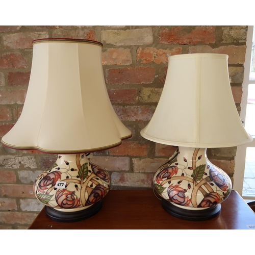 477 - A near pair of Moorcroft table lamps, Pirouette breeze pattern, 32cm high, 25cm diameter