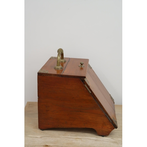 487 - A mahogany coal purdonium with brass fittings.