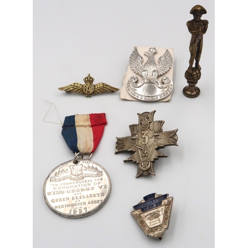 540 - A silver Polish WWII badge and various commemorative medallions