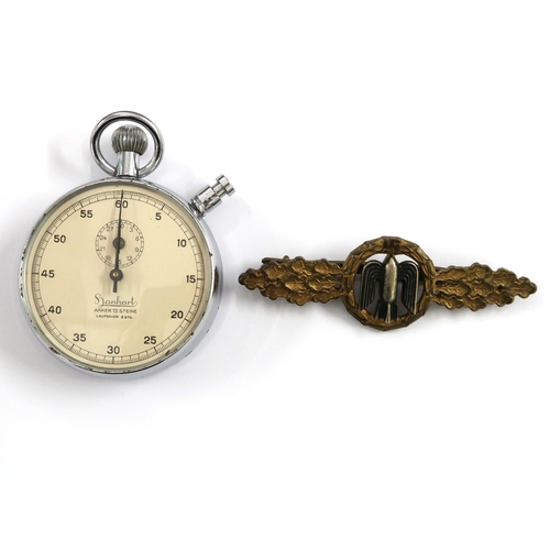 546 - A Hanhart Anker 13 Steine stopwatch circa mid 20th Century along with a Bronze WWII Luftwaffe Bomber... 