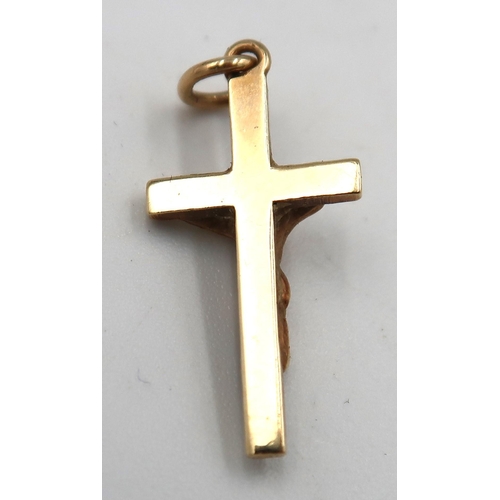 59 - A marked 9ct gold crucifix, and a pair of marked 9ct earrings stamped 375. 2.5grams