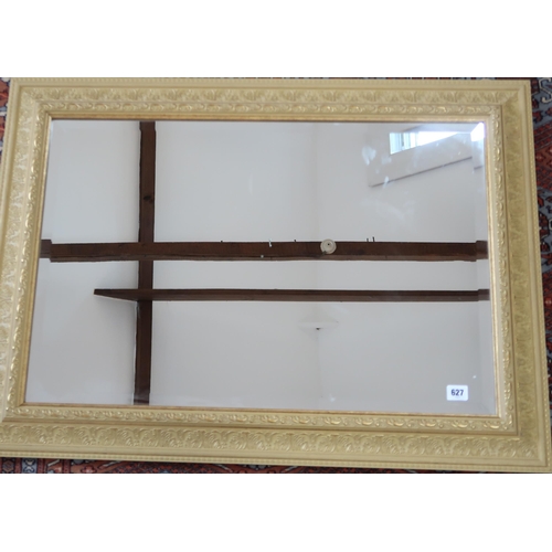 627 - A good quality wooden framed bevelled mirror, 92cm x 67cm