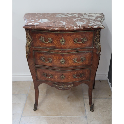 629 - A French Louis XV style, marquetry inlaid commode chest of three long drawers raised on sabre suppor... 