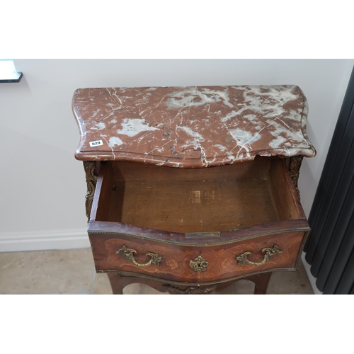 629 - A French Louis XV style, marquetry inlaid commode chest of three long drawers raised on sabre suppor... 