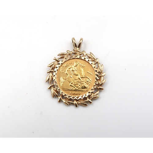 63 - A 1982 half sovereign in a 9ct yellow gold mount, 6.8 grams