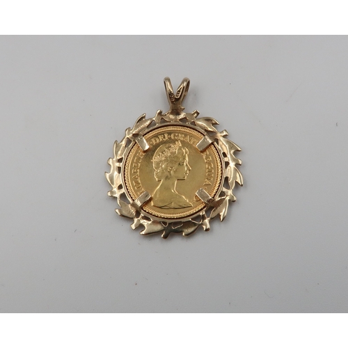 63 - A 1982 half sovereign in a 9ct yellow gold mount, 6.8 grams