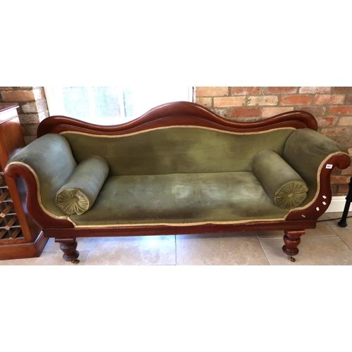 641 - A 19th century mahogany scroll arm settee on turned legs, sound condition but needs re-covering, 190... 