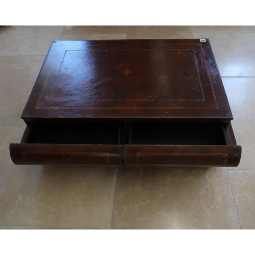 647 - Theodore Alexander, leather coffee table with two drawers in the form of 2 books, 104cm long x 44cm ... 