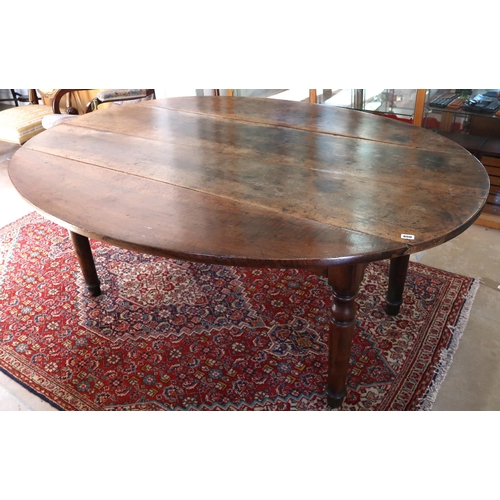 650 - A 19th century continental hardwood wake table on turned legs, 181cm long x 130cm wide