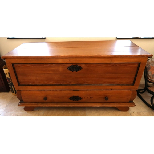 651 - A large pine continental storage box with a lift up lid above a long drawer, 158cm wide x 85cm high ... 