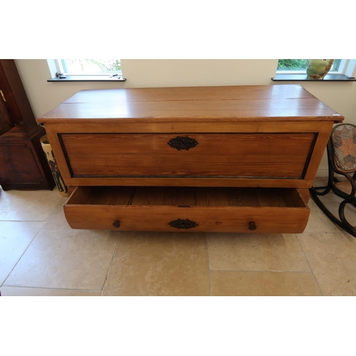 651 - A large pine continental storage box with a lift up lid above a long drawer, 158cm wide x 85cm high ... 