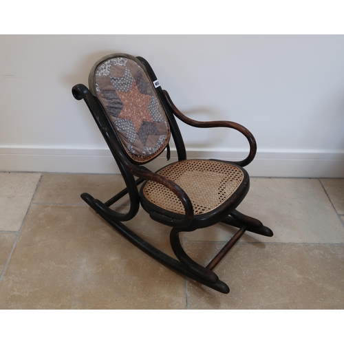 653 - A child's rocking chair, 65.6 cm deep x 39.5cm wide x 60cm high