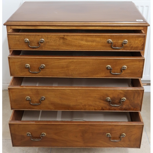 672 - A 19th Century chest of four long graduated drawers above shaped apron raised on splayed bracket fee... 