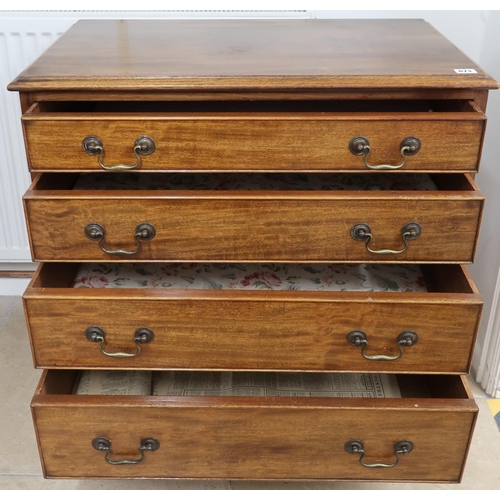 673 - A 19th Century chest of four long graduated drawers above shaped apron raised on splayed bracket fee... 