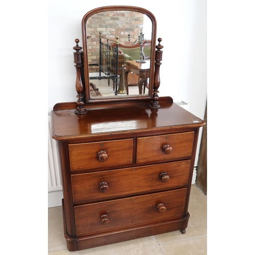 675 - A Victorian mahogany veneered dressing chest, Mirror over two short over two long drawers on plinth ... 