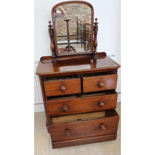 675 - A Victorian mahogany veneered dressing chest, Mirror over two short over two long drawers on plinth ... 