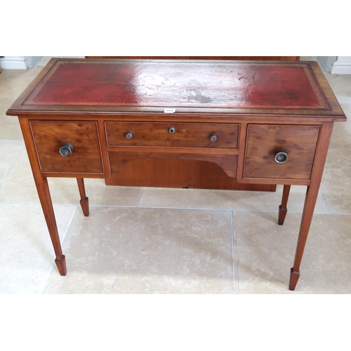 688 - An Edwardian three drawer desk with tooled leather top leather inset scriber 75cm high x 100 cm wide... 