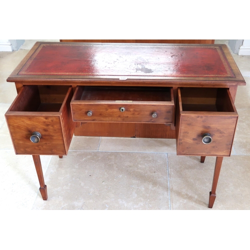 688 - An Edwardian three drawer desk with tooled leather top leather inset scriber 75cm high x 100 cm wide... 