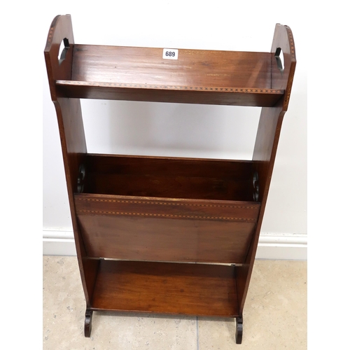 689 - An Edwardian mahogany and inlaid book trough/ magazine rack 78cm high x 44cm wide x 17cm deep.