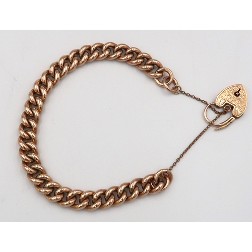 7 - A 9ct gold curb link bracelet with padlock clasp, weight 16.06 grams length 13cm.