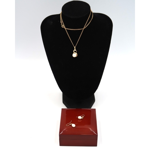 9 - A 9ct gold cultured pearl and diamond pendant, suspended from a curb link chain. Together with fresh... 