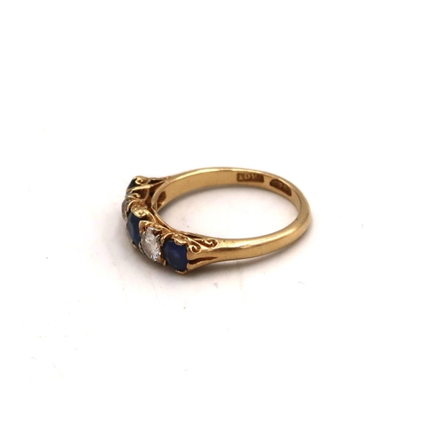 98 - An 18ct stamped yellow gold dress ring with two diamonds and three sapphires to shoulder, size M, ap... 