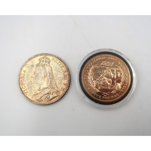 426A - An 1887 Crown and a 1993 Isle of Man £5 coin.