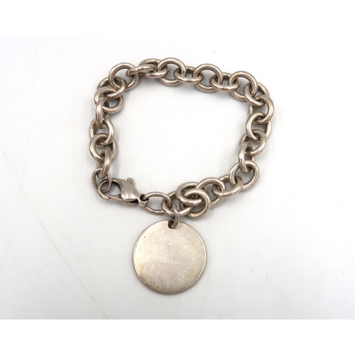 195 - A silver Tiffany & Co - Please Return to Tiffany - Round Circle Tag Bracelet - 20cm including clasp ... 