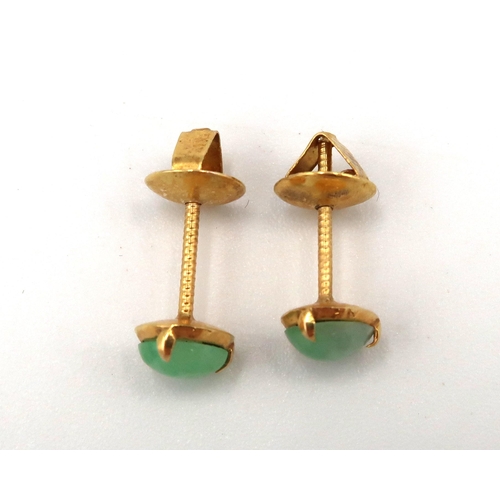 197 - A pair of Jade studs set in 22ct yellow gold - approx total weight 0.9 grams