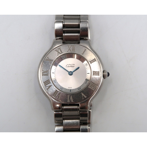 289 - A Ladies Le Must de Carter wristwatch, the silvered dial signed must de Cartier, fitted with blued s... 